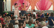 assembly Storyteller Chip performing to a huge crowd of delighted children at a festival